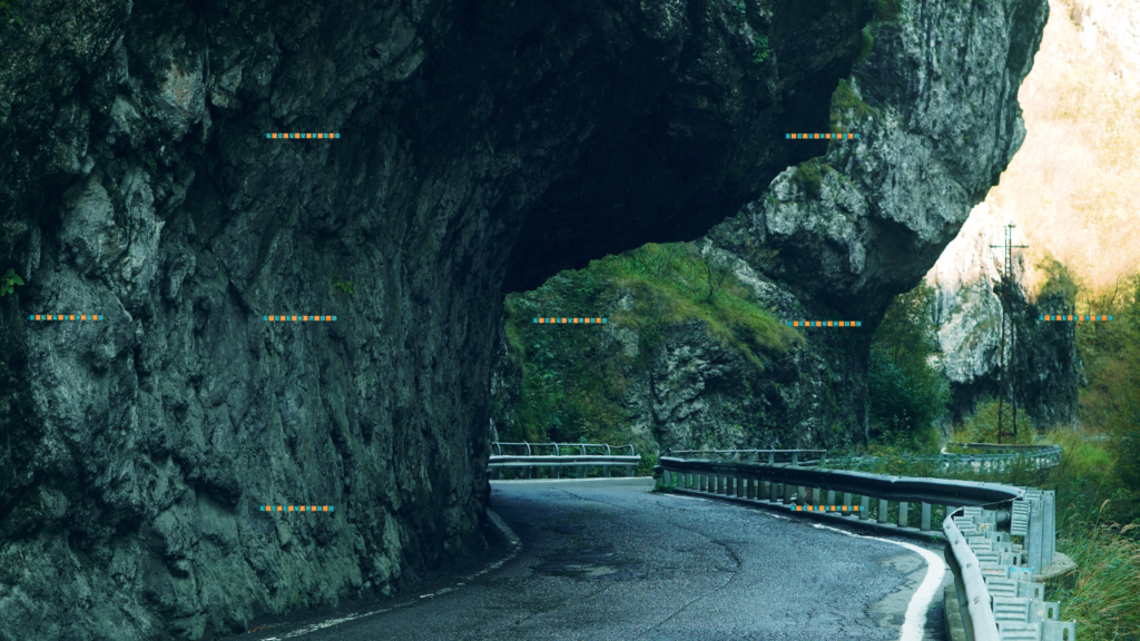 Val Taleggio Gorge, narrow road under rocks